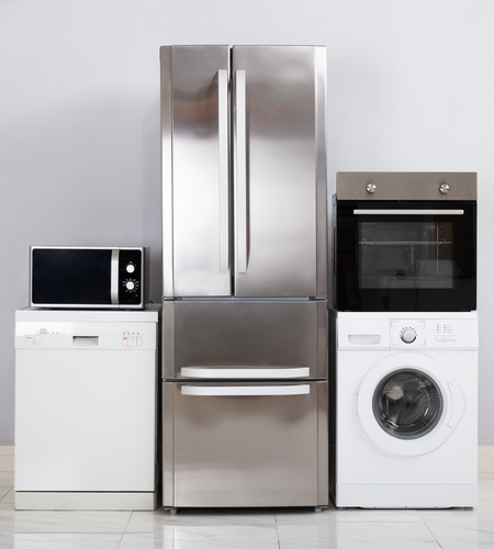 Unsafe electrical products - microwave on dishwasher, French door stainless fridge, oven on washing machine in showroom