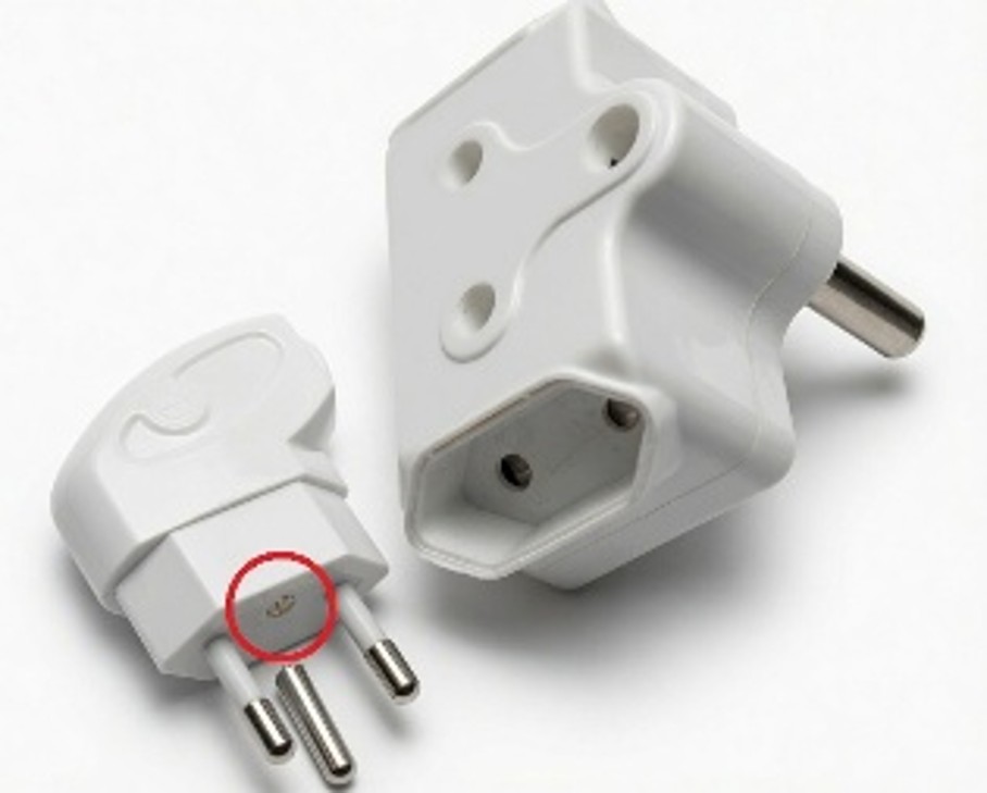 Illegal removal of the earth pin to fit into an adapter